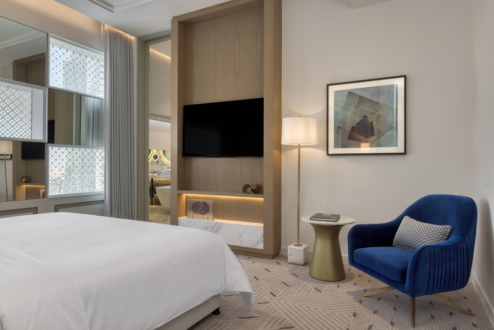 luxury corner suite room bed tv chair atheel kafd hotel