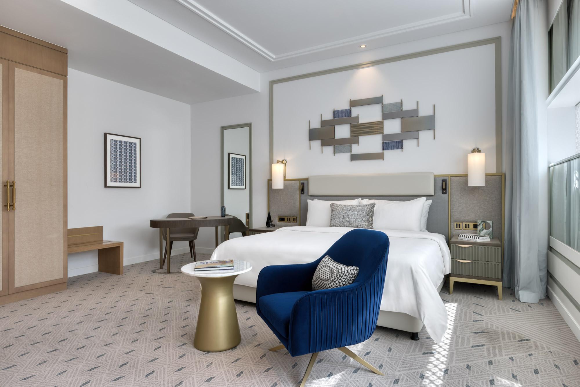 luxury executive suite room king  bed working desk atheel kafd hotel