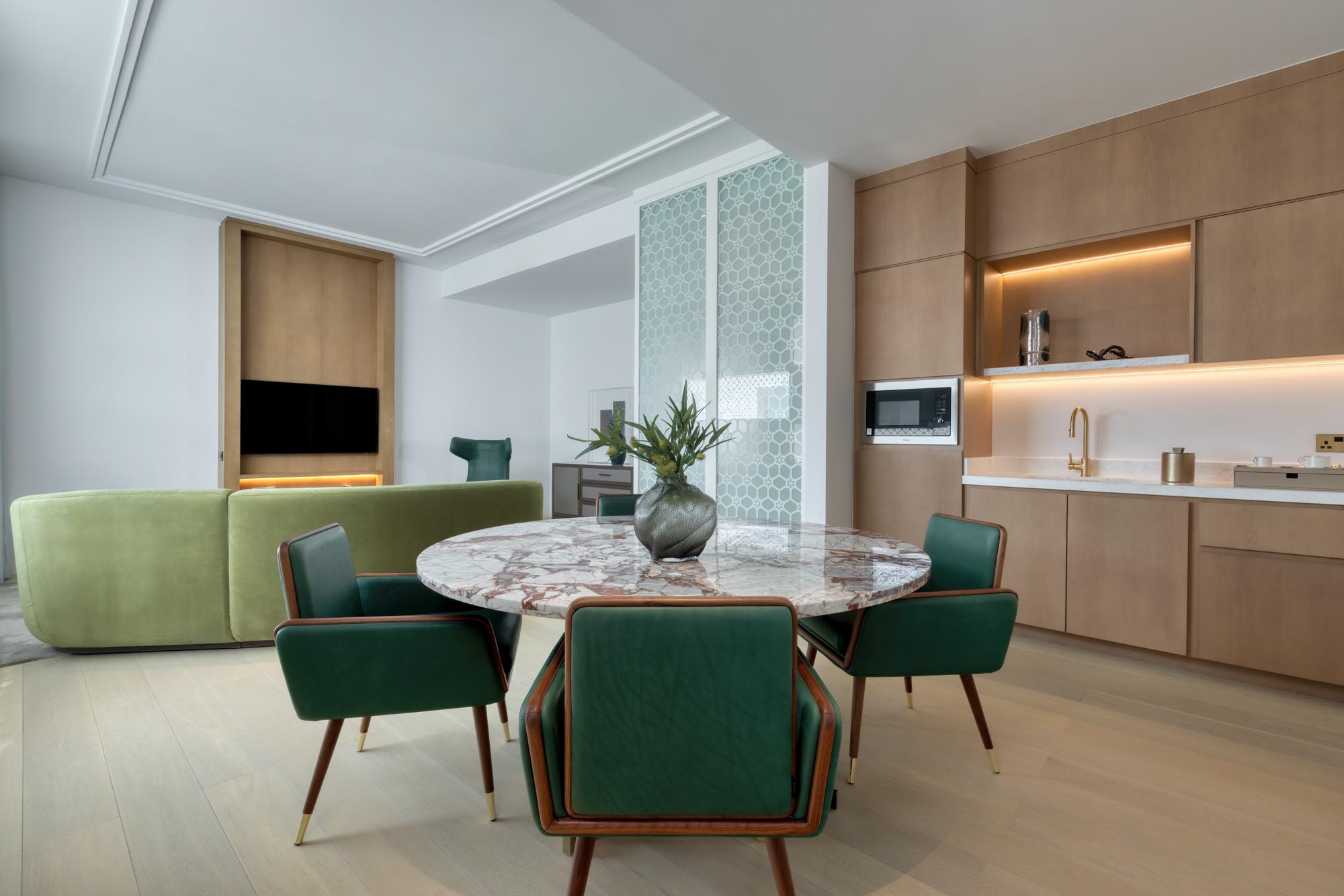 luxury executive suite room livingroom dining table kitchen atheel kafd hotel