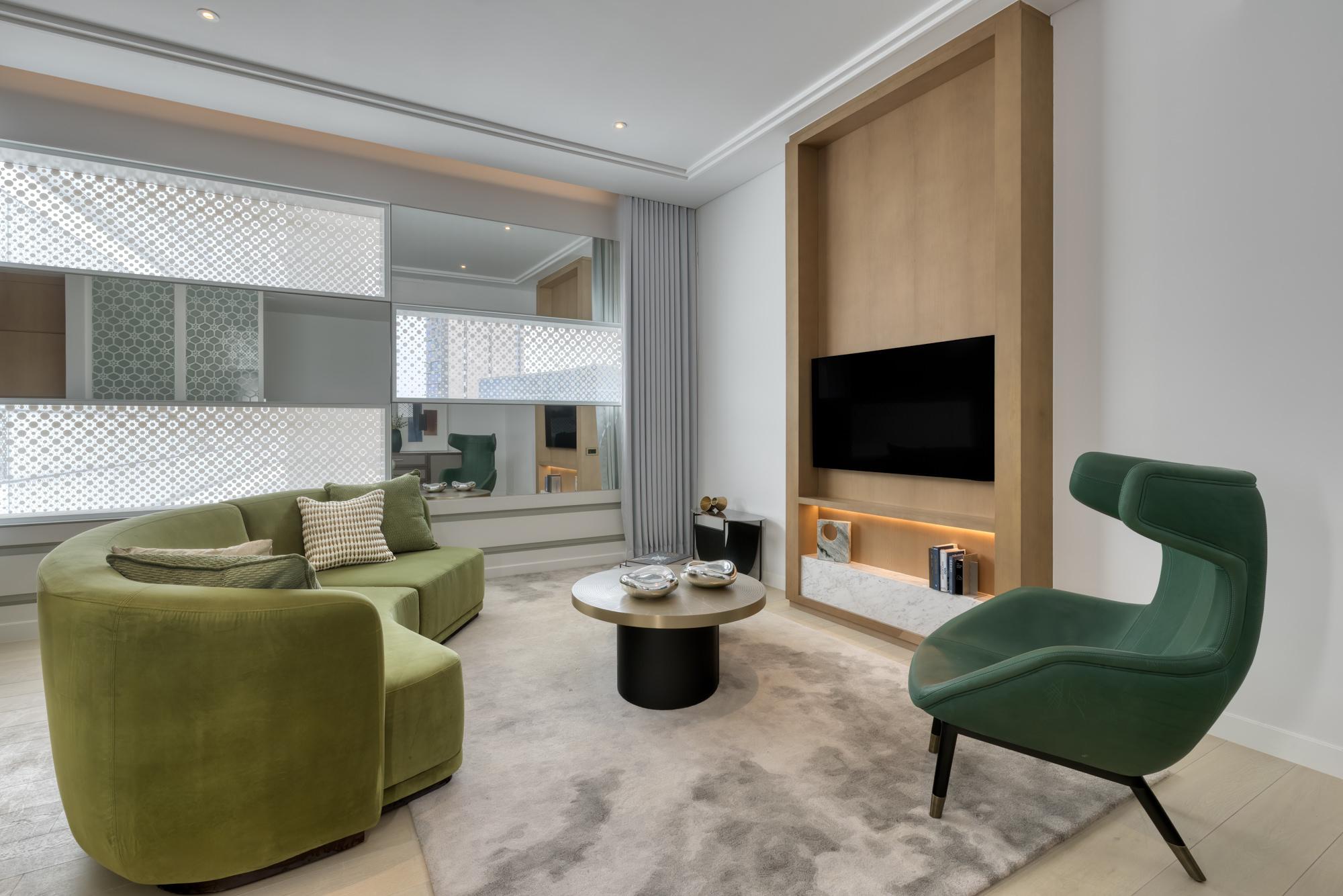 luxury executive suite room livingroom sofa tv atheel kafd hotel